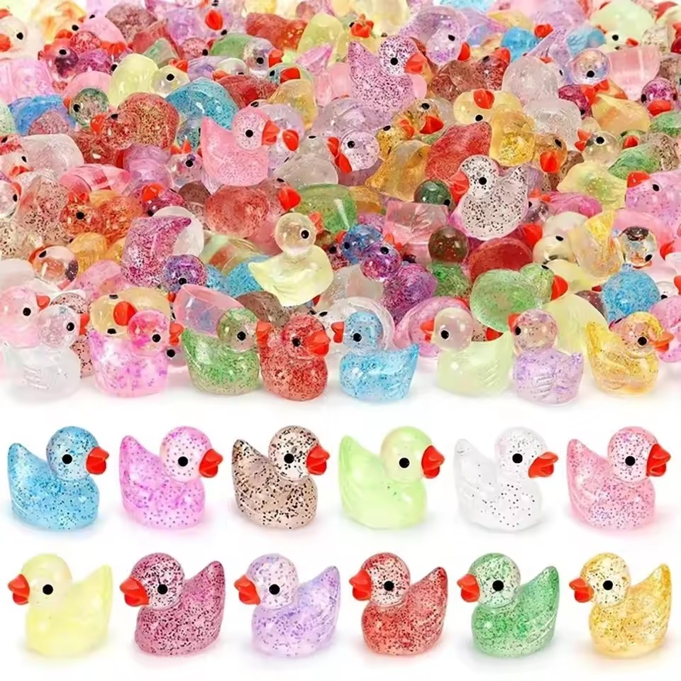 ~ Miniature resin duck with pu - огляд і ціна Pothos